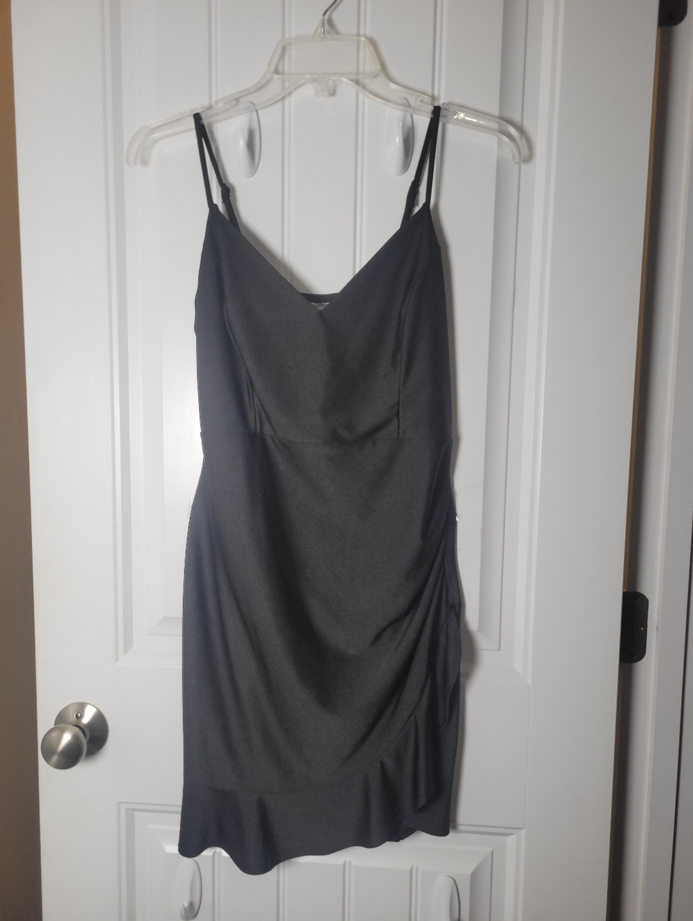 Sleek Black Spaghetti-Strap mini dress with  v neck by ELH Studio.  Size M